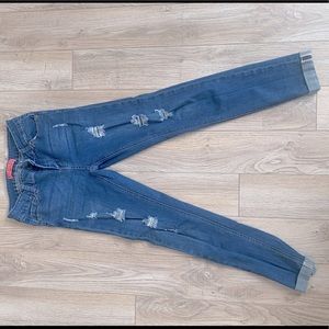 Distressed skinny jeans